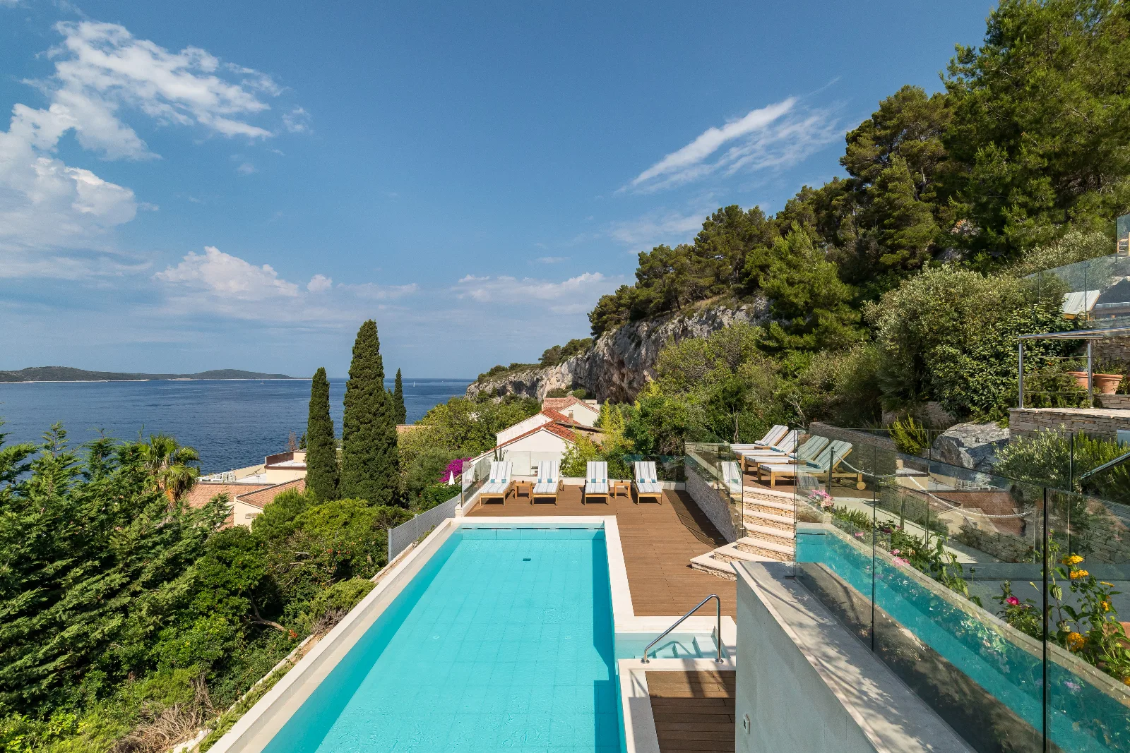 Infinity pool and sun deck looking out over the Adriatic