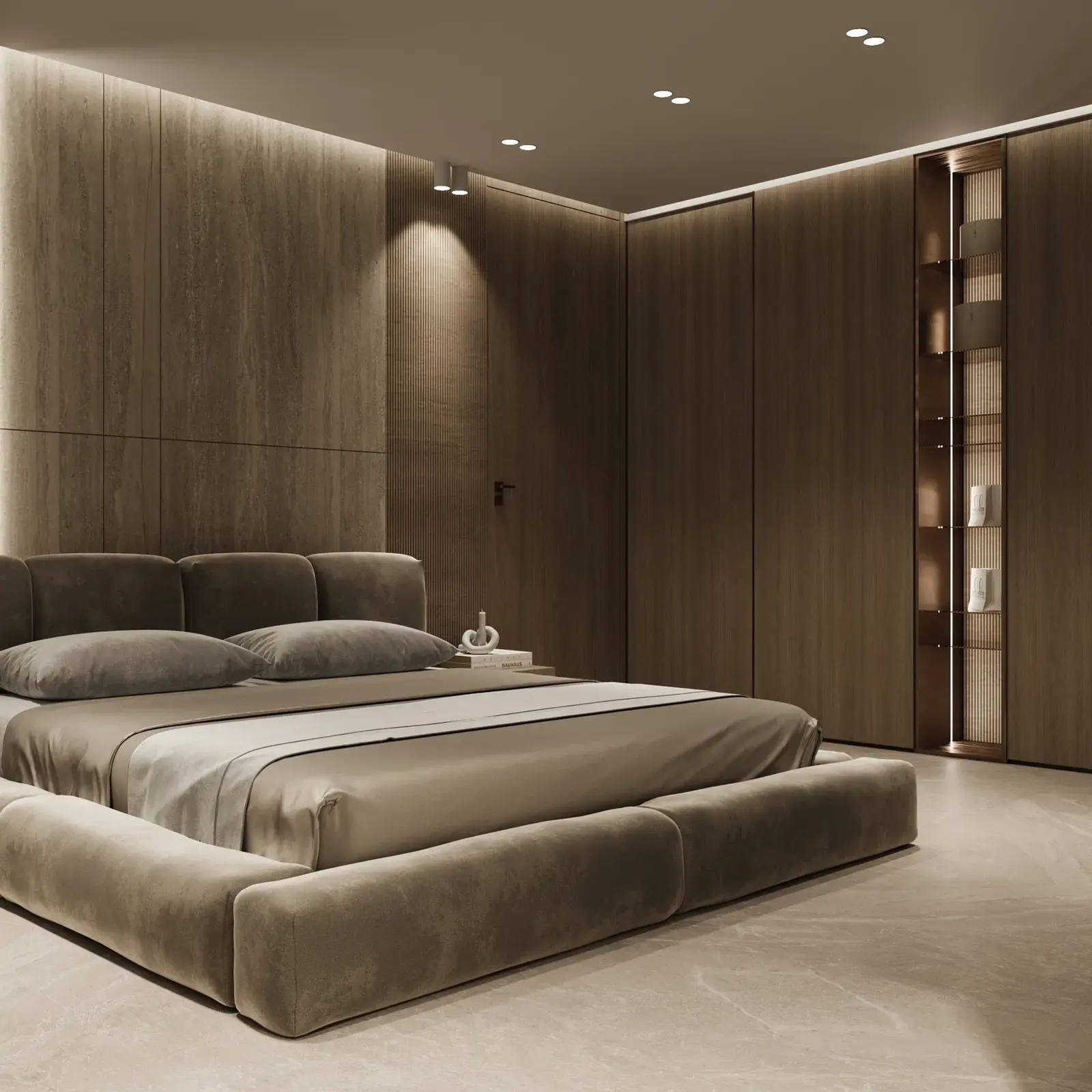 Bedroom panelled in warm oak with a low upholstered platform bed and a backlit display niche